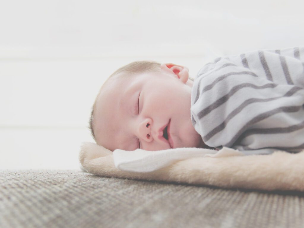 rolled up blanket method for babies sleep